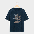 Black t-shirt with a graphic design and text on a gray background