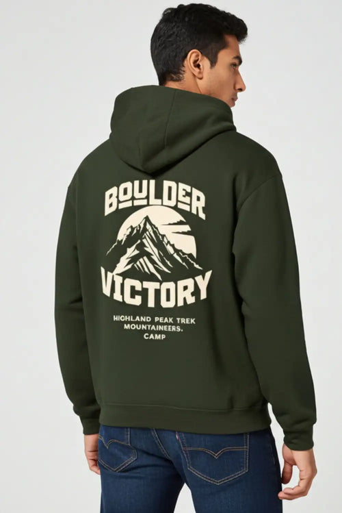 Person wearing a green hoodie with 'Boulder Victory' text and mountain graphic on the back.