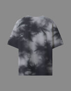 T-shirt with a black and white abstract pattern on a gray background