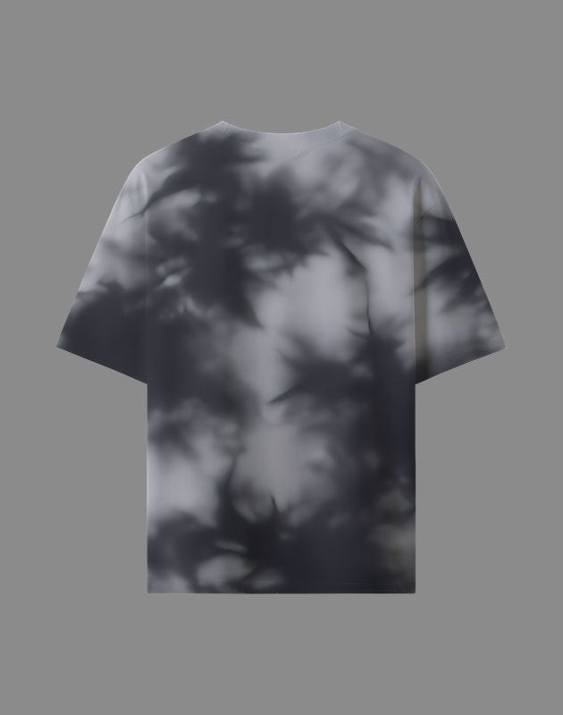 T-shirt with a black and white abstract pattern on a gray background