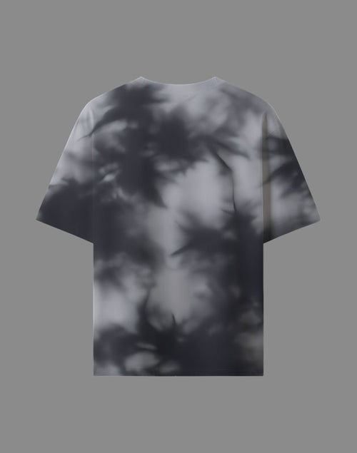 T-shirt with a black and white abstract pattern on a gray background