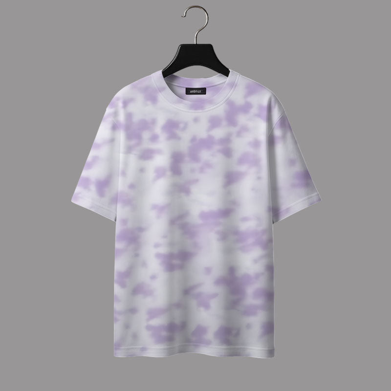 White t-shirt with purple cloud pattern on a hanger against a gray background
