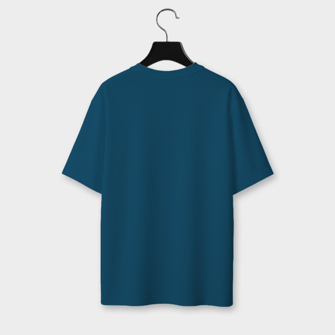Blue t-shirt on a hanger against a light gray background