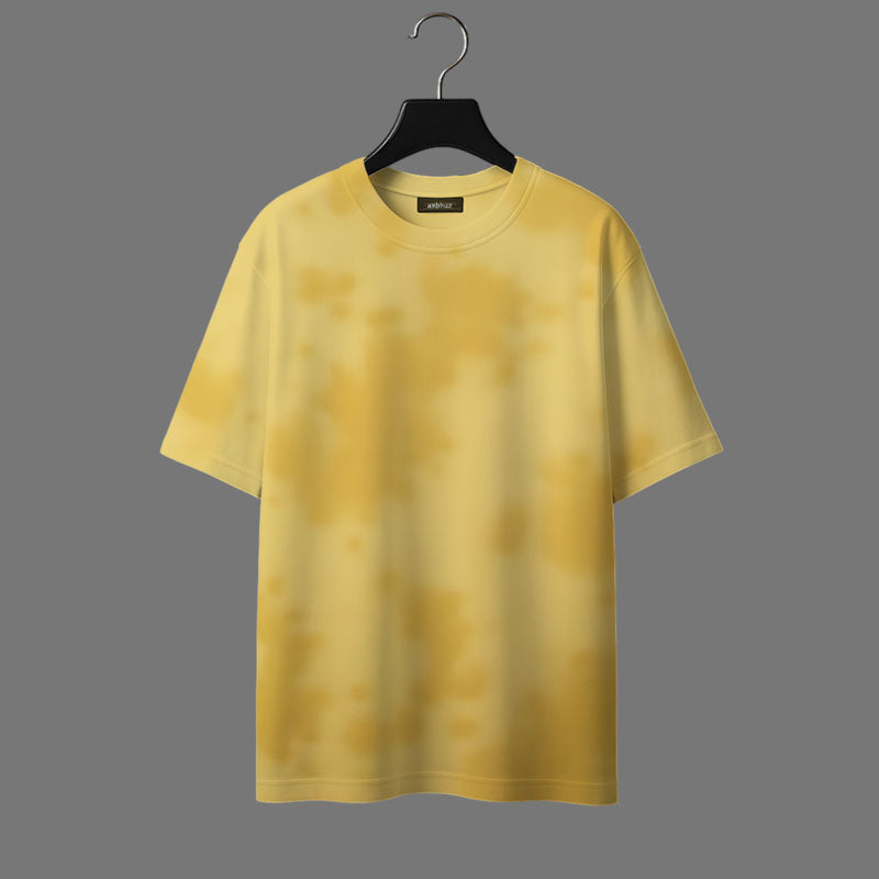 Yellow t-shirt on a hanger against a gray background