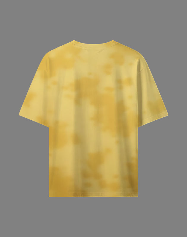 Yellow t-shirt on a grey background with abstract acid wash pattern
